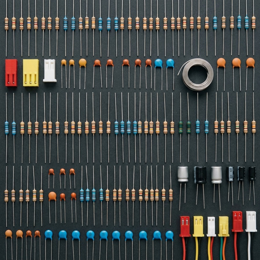 Resistors, capacitors and connectors laid out in a grid